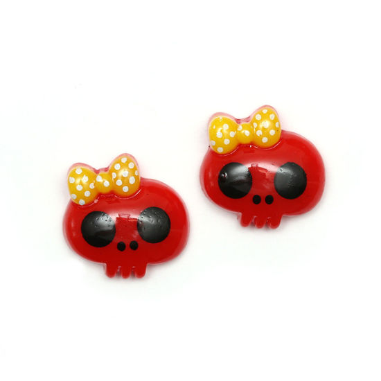 Red baby doll skull with bow clip-on earrings