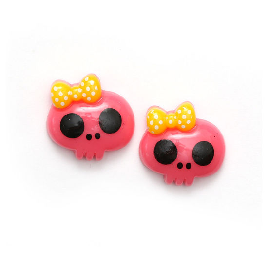 Regal rose pink baby doll skull with bow clip-on earrings