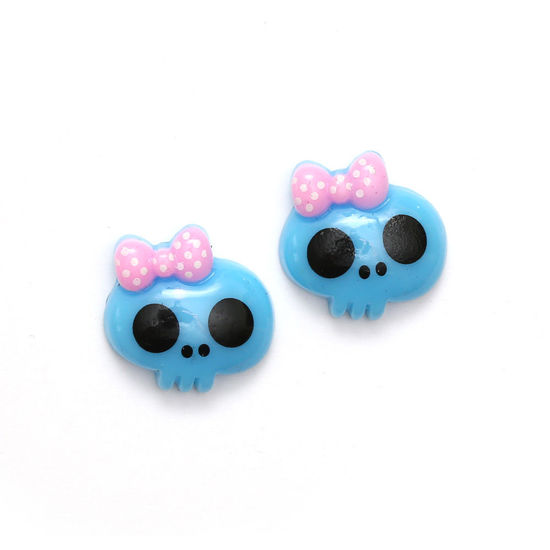Blue baby doll skull with bow clip-on earrings