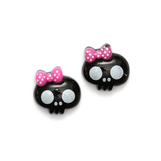 Black baby doll skull with bow clip-on earrings